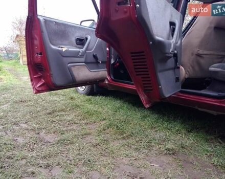 Червоний Форд Ескорт, об'ємом двигуна 1.39 л та пробігом 93 тис. км за 1325 $, фото 11 на Automoto.ua