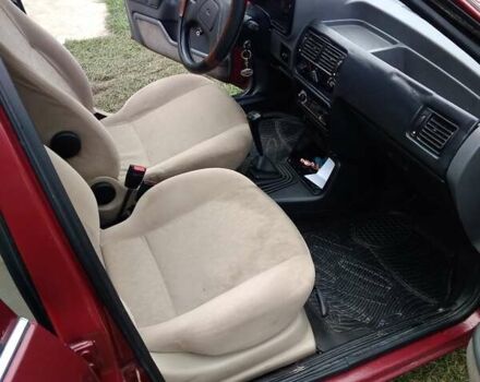 Червоний Форд Ескорт, об'ємом двигуна 1.39 л та пробігом 93 тис. км за 1325 $, фото 37 на Automoto.ua