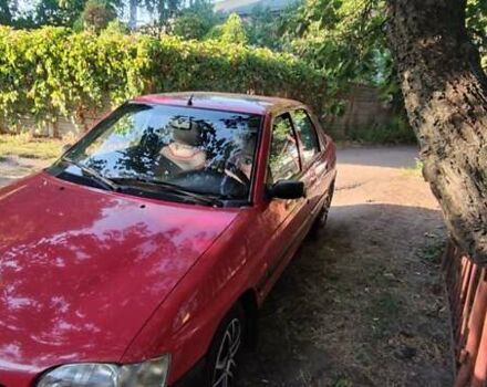 Червоний Форд Ескорт, об'ємом двигуна 1.3 л та пробігом 247 тис. км за 1800 $, фото 1 на Automoto.ua