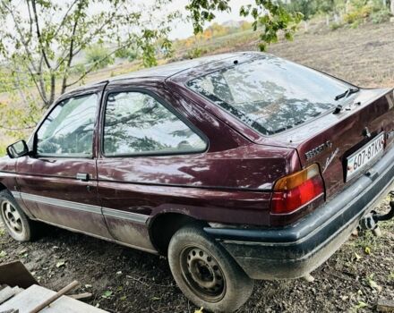 Красный Форд Эскорт, объемом двигателя 1.8 л и пробегом 111 тыс. км за 600 $, фото 2 на Automoto.ua