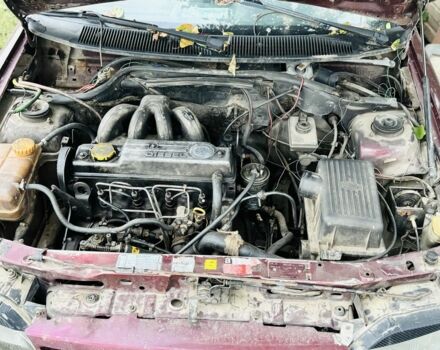 Красный Форд Эскорт, объемом двигателя 1.8 л и пробегом 111 тыс. км за 600 $, фото 4 на Automoto.ua