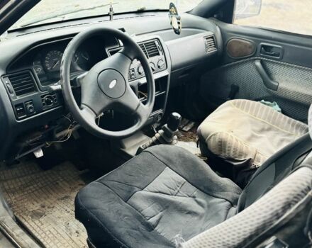 Красный Форд Эскорт, объемом двигателя 1.8 л и пробегом 111 тыс. км за 600 $, фото 6 на Automoto.ua