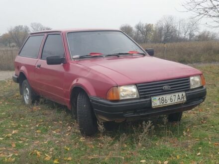 Красный Форд Эскорт, объемом двигателя 1.3 л и пробегом 165 тыс. км за 550 $, фото 1 на Automoto.ua