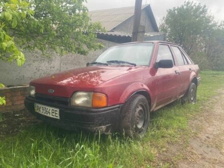 Форд Эскорт 1986 в Чугуеве на Automoto.ua Красный Форд Эскорт, объемом двигателя 1.4 л и пробегом 100 тыс. км за 650 $, фото 1 на Automoto.ua