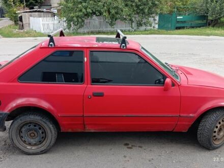 Форд Эскорт 1989 в Виннице на Automoto.ua Красный Форд Эскорт, объемом двигателя 1.4 л и пробегом 300 тыс. км за 650 $, фото 1 на Automoto.ua