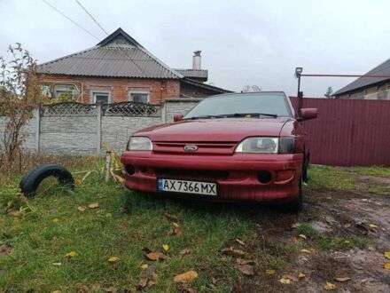 Красный Форд Эскорт, объемом двигателя 1.4 л и пробегом 300 тыс. км за 950 $, фото 1 на Automoto.ua