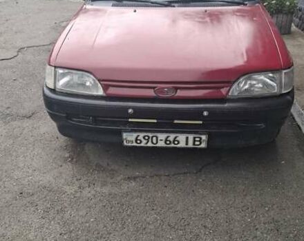 Красный Форд Эскорт, объемом двигателя 1.4 л и пробегом 100 тыс. км за 550 $, фото 1 на Automoto.ua