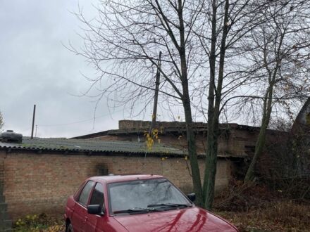 Красный Форд Эскорт, объемом двигателя 1.4 л и пробегом 650 тыс. км за 548 $, фото 1 на Automoto.ua