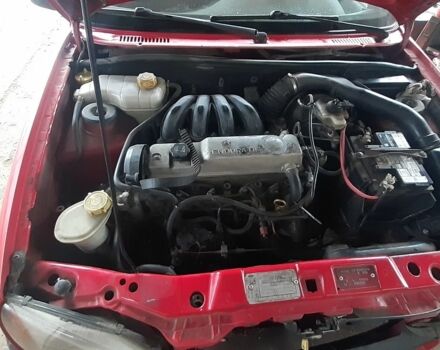 Красный Форд Эскорт, объемом двигателя 1.8 л и пробегом 400 тыс. км за 475 $, фото 1 на Automoto.ua