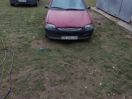 Красный Форд Эскорт, объемом двигателя 1.4 л и пробегом 300 тыс. км за 499 $, фото 1 на Automoto.ua