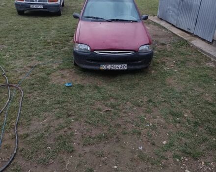 Красный Форд Эскорт, объемом двигателя 1.4 л и пробегом 300 тыс. км за 499 $, фото 1 на Automoto.ua