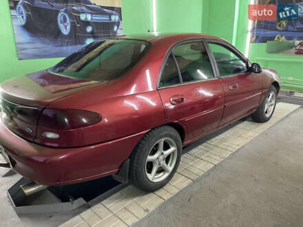 Красный Форд Эскорт, объемом двигателя 2 л и пробегом 216 тыс. км за 2500 $, фото 1 на Automoto.ua
