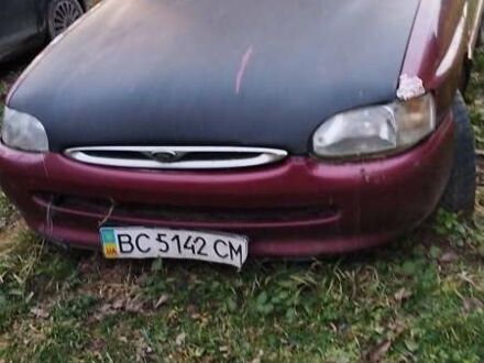 Красный Форд Эскорт, объемом двигателя 1.4 л и пробегом 180 тыс. км за 665 $, фото 1 на Automoto.ua