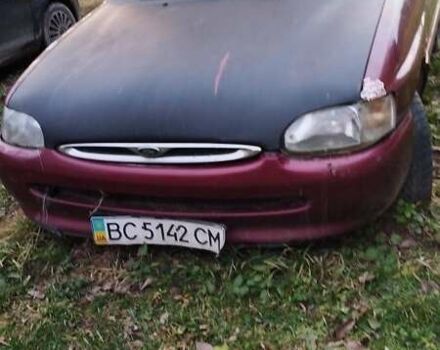 Красный Форд Эскорт, объемом двигателя 1.4 л и пробегом 180 тыс. км за 665 $, фото 1 на Automoto.ua