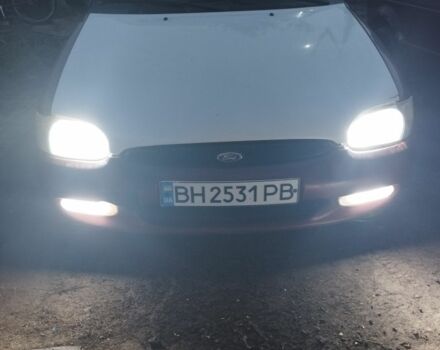 Красный Форд Эскорт, объемом двигателя 1.6 л и пробегом 400 тыс. км за 1300 $, фото 1 на Automoto.ua