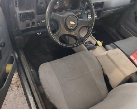 Серый Форд Эскорт, объемом двигателя 1.3 л и пробегом 161 тыс. км за 706 $, фото 7 на Automoto.ua