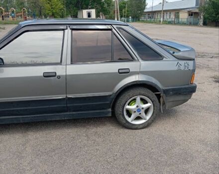 Серый Форд Эскорт, объемом двигателя 1.3 л и пробегом 287 тыс. км за 792 $, фото 3 на Automoto.ua