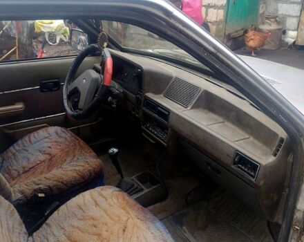 Серый Форд Эскорт, объемом двигателя 1.3 л и пробегом 338 тыс. км за 544 $, фото 2 на Automoto.ua