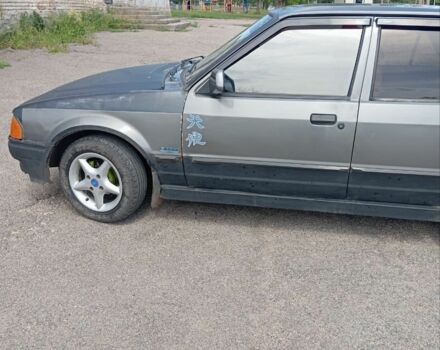 Серый Форд Эскорт, объемом двигателя 1.3 л и пробегом 287 тыс. км за 792 $, фото 2 на Automoto.ua