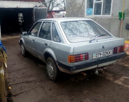 Серый Форд Эскорт, объемом двигателя 1.3 л и пробегом 338 тыс. км за 544 $, фото 5 на Automoto.ua