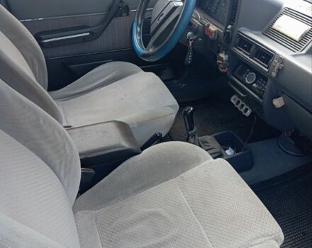 Серый Форд Эскорт, объемом двигателя 1.3 л и пробегом 287 тыс. км за 792 $, фото 5 на Automoto.ua