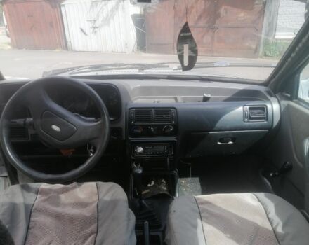 Серый Форд Эскорт, объемом двигателя 1.4 л и пробегом 777 тыс. км за 650 $, фото 5 на Automoto.ua