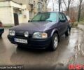 Серый Форд Эскорт, объемом двигателя 1.4 л и пробегом 136 тыс. км за 1200 $, фото 1 на Automoto.ua