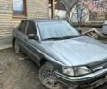 Серый Форд Эскорт, объемом двигателя 1.3 л и пробегом 200 тыс. км за 500 $, фото 1 на Automoto.ua
