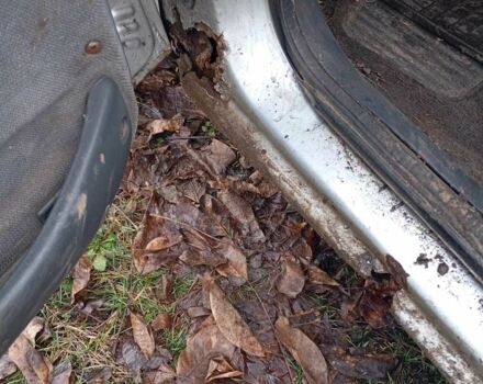 Серый Форд Эскорт, объемом двигателя 1.4 л и пробегом 200 тыс. км за 804 $, фото 5 на Automoto.ua