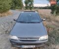 Сірий Форд Ескорт, об'ємом двигуна 1.4 л та пробігом 231 тис. км за 1800 $, фото 1 на Automoto.ua