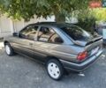 Сірий Форд Ескорт, об'ємом двигуна 1.4 л та пробігом 231 тис. км за 1800 $, фото 4 на Automoto.ua