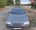 Серый Форд Эскорт, объемом двигателя 1.4 л и пробегом 231 тыс. км за 1800 $, фото 1 на Automoto.ua