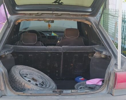 Серый Форд Эскорт, объемом двигателя 1.4 л и пробегом 300 тыс. км за 358 $, фото 1 на Automoto.ua