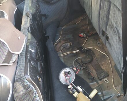 Серый Форд Эскорт, объемом двигателя 1.4 л и пробегом 300 тыс. км за 358 $, фото 2 на Automoto.ua