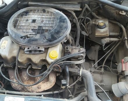 Серый Форд Эскорт, объемом двигателя 1.4 л и пробегом 300 тыс. км за 358 $, фото 4 на Automoto.ua