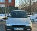 Серый Форд Эскорт, объемом двигателя 1.4 л и пробегом 206 тыс. км за 1100 $, фото 2 на Automoto.ua