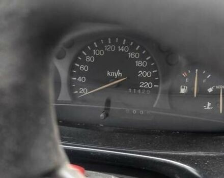 Серый Форд Эскорт, объемом двигателя 1.3 л и пробегом 1114 тыс. км за 1800 $, фото 2 на Automoto.ua