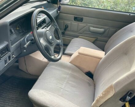 Серый Форд Эскорт, объемом двигателя 1.3 л и пробегом 300 тыс. км за 680 $, фото 3 на Automoto.ua