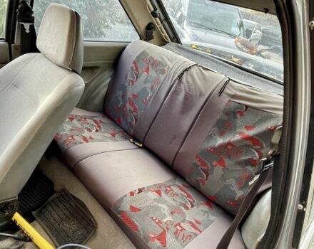 Серый Форд Эскорт, объемом двигателя 1.3 л и пробегом 300 тыс. км за 680 $, фото 4 на Automoto.ua