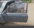 Серый Форд Эскорт, объемом двигателя 1 л и пробегом 45 тыс. км за 121 $, фото 2 на Automoto.ua