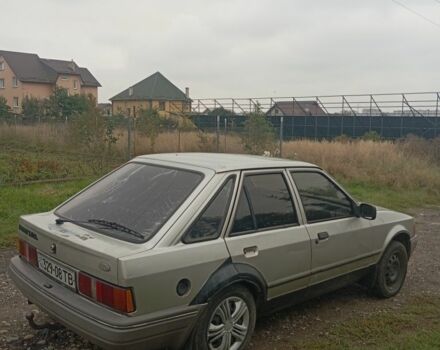 Сірий Форд Ескорт, об'ємом двигуна 1.4 л та пробігом 300 тис. км за 475 $, фото 1 на Automoto.ua