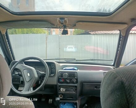 Серый Форд Эскорт, объемом двигателя 1.4 л и пробегом 300 тыс. км за 953 $, фото 6 на Automoto.ua