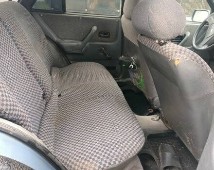 Серый Форд Эскорт, объемом двигателя 1.4 л и пробегом 300 тыс. км за 953 $, фото 5 на Automoto.ua