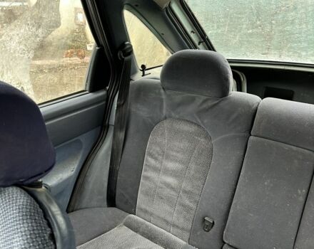 Серый Форд Эскорт, объемом двигателя 1.3 л и пробегом 67 тыс. км за 350 $, фото 12 на Automoto.ua