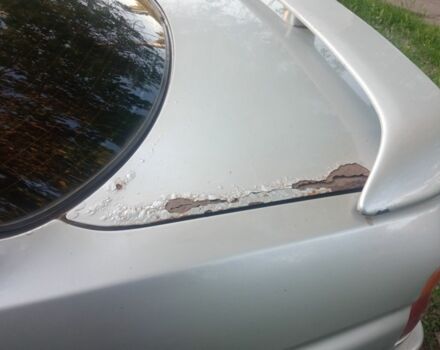 Серый Форд Эскорт, объемом двигателя 1.4 л и пробегом 300 тыс. км за 712 $, фото 6 на Automoto.ua