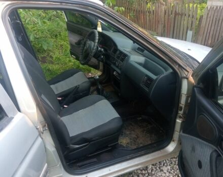 Серый Форд Эскорт, объемом двигателя 1.4 л и пробегом 300 тыс. км за 712 $, фото 10 на Automoto.ua