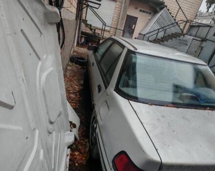 Серый Форд Эскорт, объемом двигателя 1.9 л и пробегом 300 тыс. км за 521 $, фото 4 на Automoto.ua