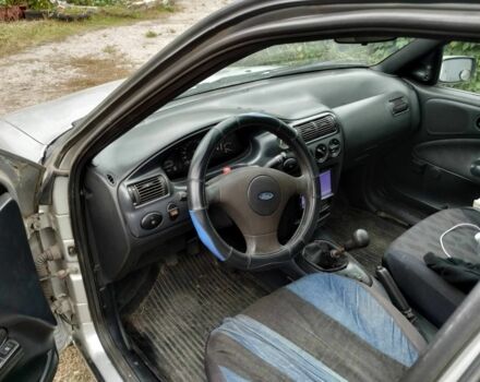 Серый Форд Эскорт, объемом двигателя 1.3 л и пробегом 258 тыс. км за 1000 $, фото 6 на Automoto.ua