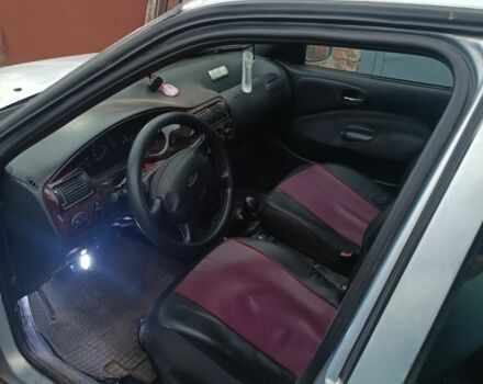 Серый Форд Эскорт, объемом двигателя 1.6 л и пробегом 300 тыс. км за 1200 $, фото 4 на Automoto.ua