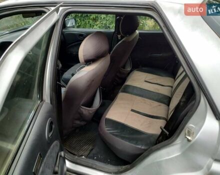 Серый Форд Эскорт, объемом двигателя 1.3 л и пробегом 258 тыс. км за 1000 $, фото 6 на Automoto.ua